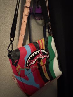 Spray ground cross body