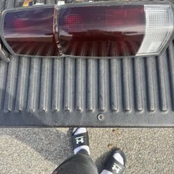 1(contact info removed) Nissan D21 Smoked Taillights $40