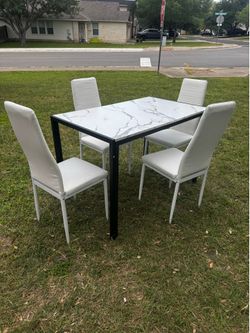 Breakfast table with chairs