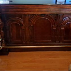 Cherry Wood Bar With A Granite Countertop 