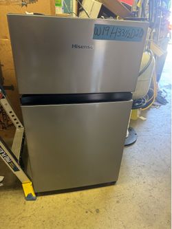 Compact refrigerator Hisense top and bottom