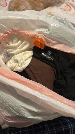 Bag of name brand clothes