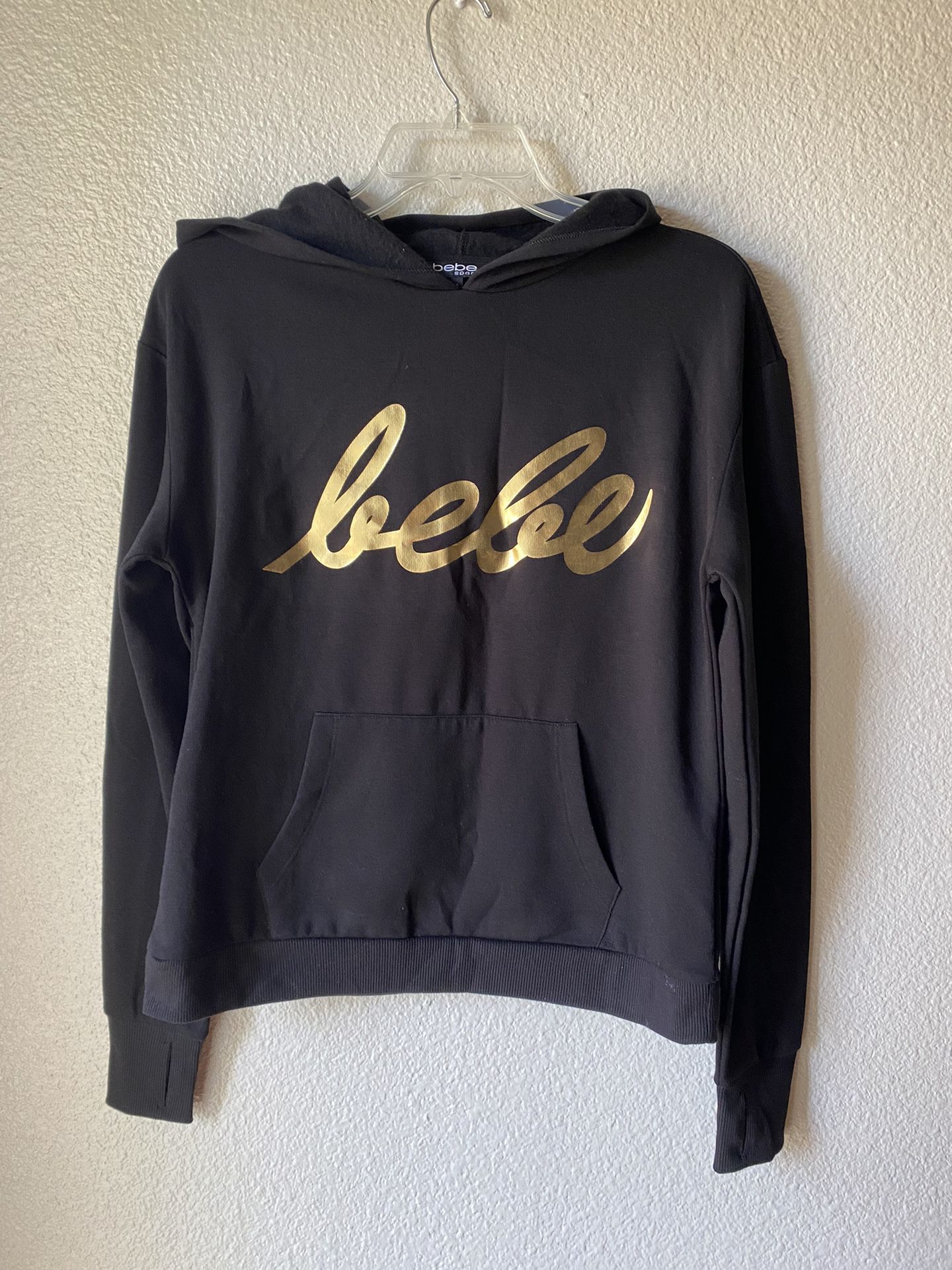 Brand New Womans Bebe brand Black Hoodie Up For Sale 