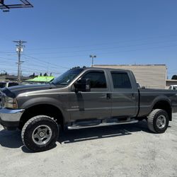 2004 Ford F250 Crew Cab 4x4 256k miles 6.0 diesel  Egr delete, magna, flow, exhaust aluminum radiator, high amp, alternator,  runs excellent  Transmis