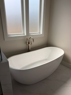 White Freestanding Soaking Bathtub