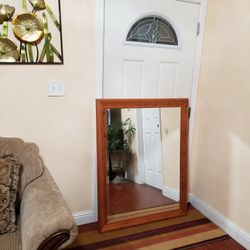 Large Mirror professionally Framed. Measurements are 46 inches by 36 inches. 