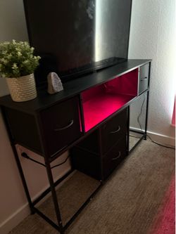 Black entertainment center with drawers