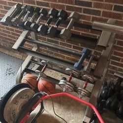 Dumb Bell rack And Dumb Bells. 