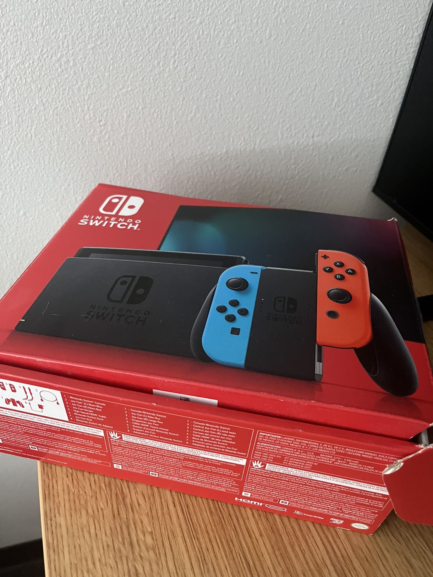 Nintendo Switch (Neon Red/Blue) – Like New Condition
