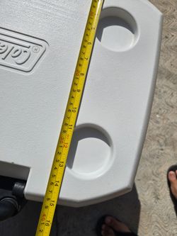 Coleman water cooler Ice Chest about 21 inches long 15 inches wide 18 inches long