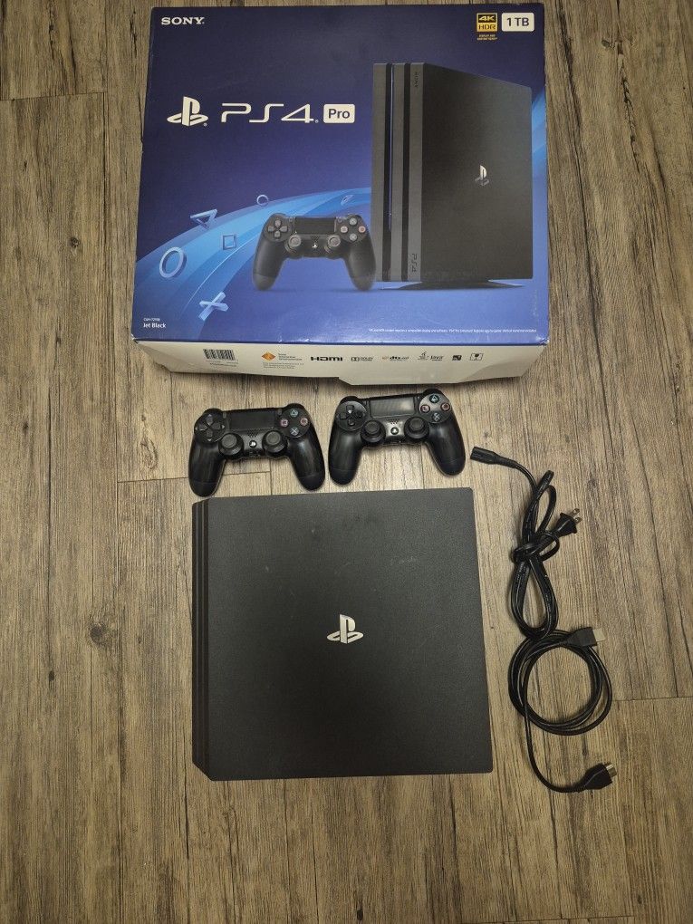 Ps4 Pro 1TB Jet Black Plus Games