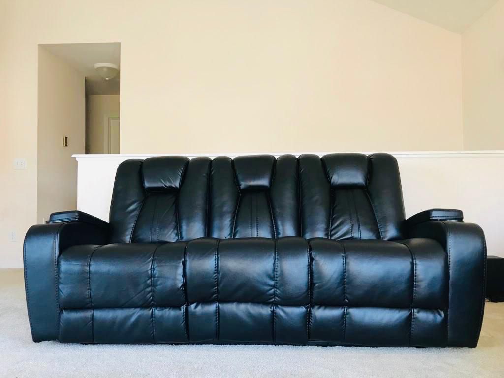 Powered reclining sofa