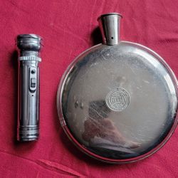 ANTIQUE EVEREADY FLASHLIGHT AND ANTIQUE CELLO HOT WATER BOTTLE FROM 1912 BONDLE  OF 2