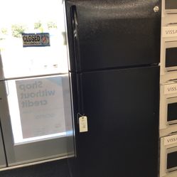 GE 16 Cu Ft Top And Bottom Fridge. 1 year Warranty 
