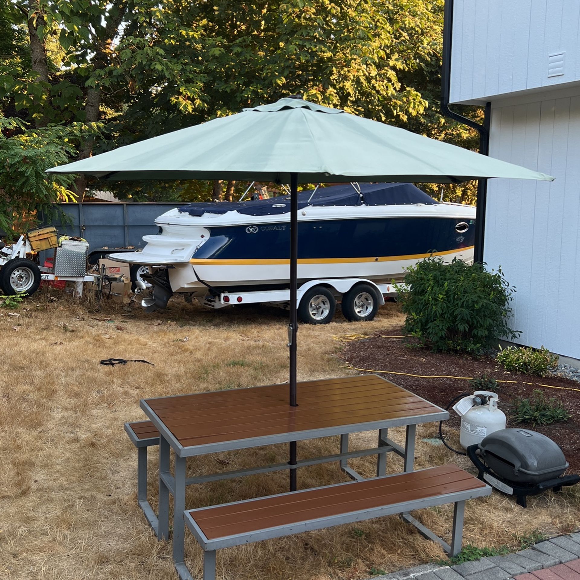 6 foot metal Trex picnic table with umbrella for Sale in Bonney Lake