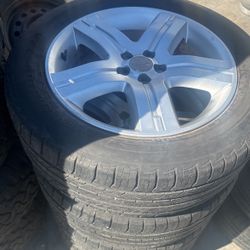Set Of Subaru Wheels And Tires