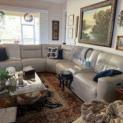 Sectional leather sofa with three recliners