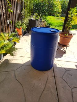55 Gallon blue plastic drum