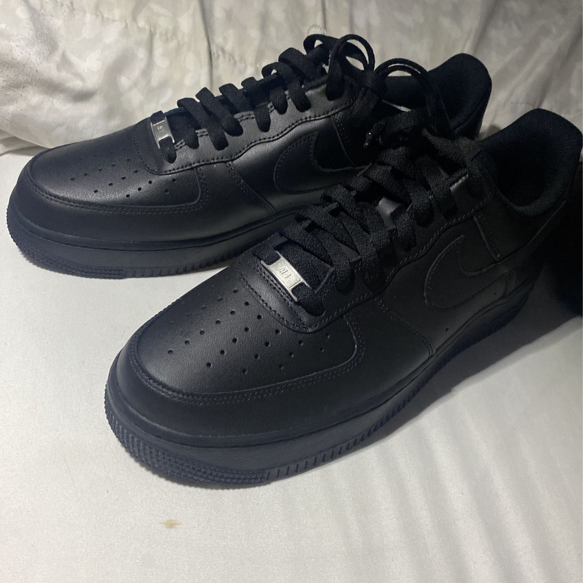 Black Air Force 1s, size 11.