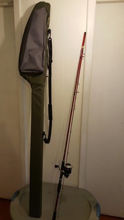 fishing pole okuma T-40X side drift and hard carry bag