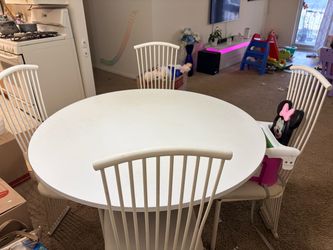 White Dining table with 4 chairs and black cover