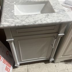 24in Vanity With Carrara Marble Too