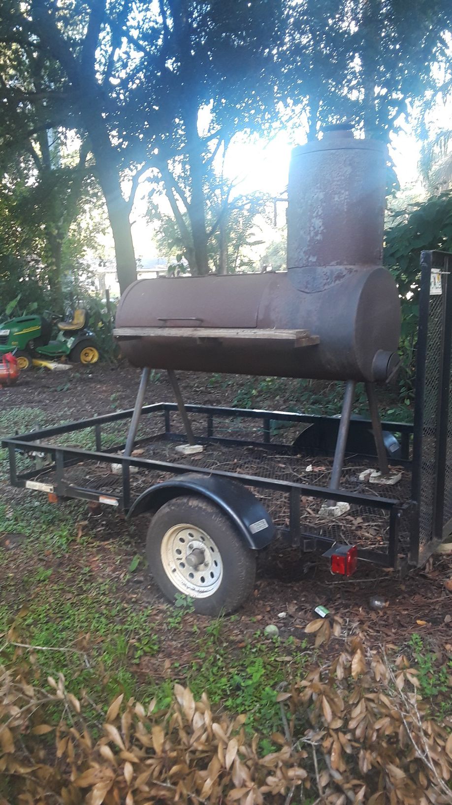 5/8 trailer. With huge gigantic smoker grill. Smoker grill is not connected. Both Grill and trailer $650