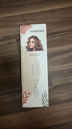 Automatic hair curling iron