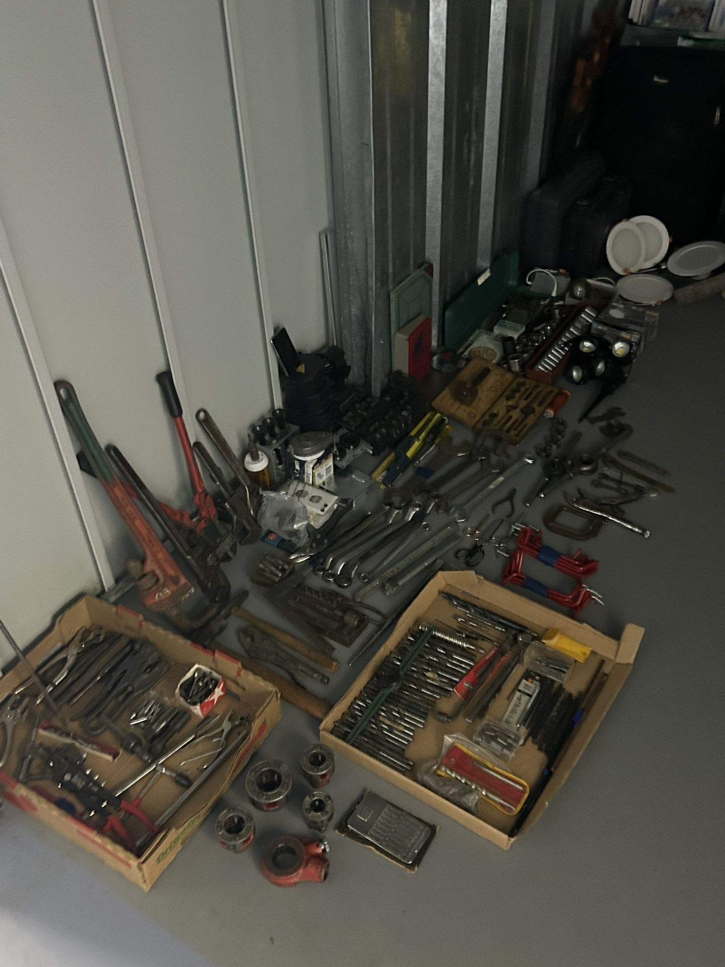 While Storage Locker Of Antique And Newer Tools And Machines 
