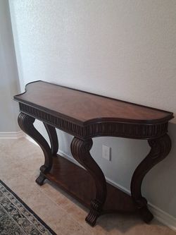 Dark Wood Console Table with Carved Detail