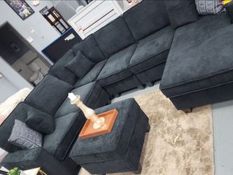Black Sectional With Otterman $799