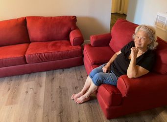 Red sofa and loveseat