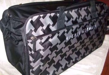 Authentic Michel Germain black and gray duffle bag brand new