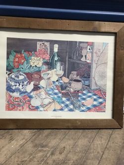 Brown framed dinning table painting