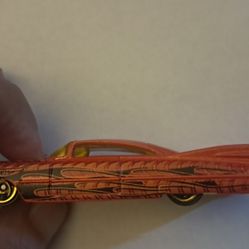 59 Cadillac - orange - Hotwheel
