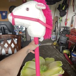 Kids, a horse mount with sound comes with the big flower