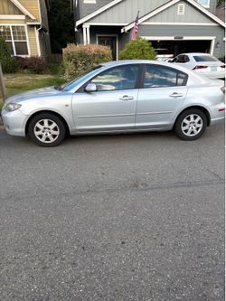 Her little Mazda car 2009