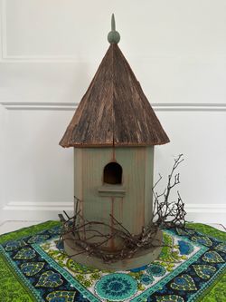 Handmade wood bird house decor with old barn wood shingle roof. Flat back so it can hang on the wall or it can sit as well. Very well made.  Large 16”