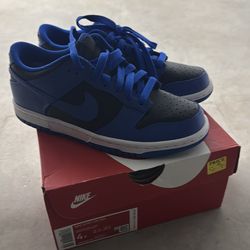 4Y black hyper cobalt, white low Nike dunks