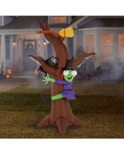 Halloween Inflatable Witch Crashed Into Tree