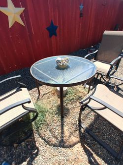 Outdoor table and three chairs
