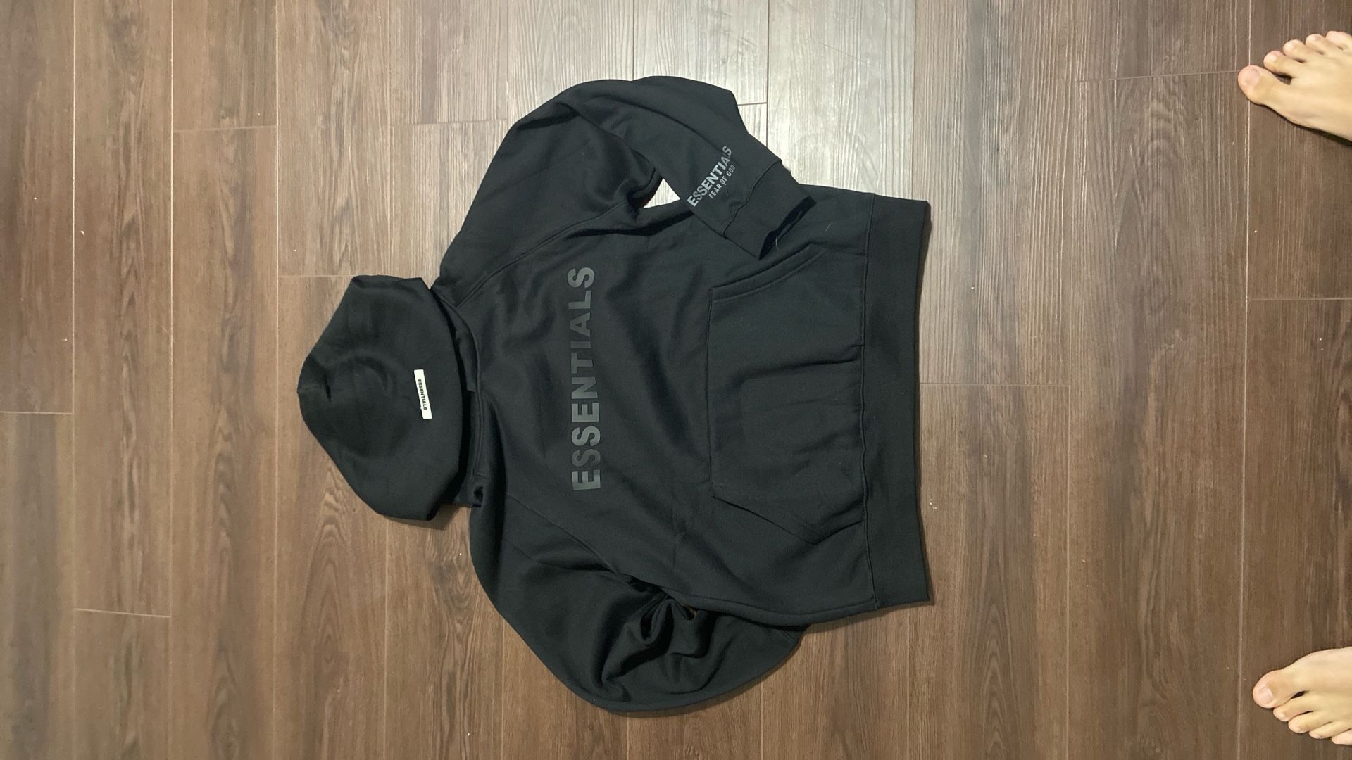 black essential hoodie