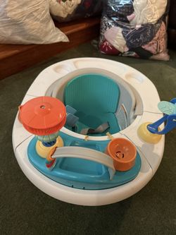 Summer 4-in-1 SuperSeat 360, a multi-use booster seat designed for infants and toddlers.