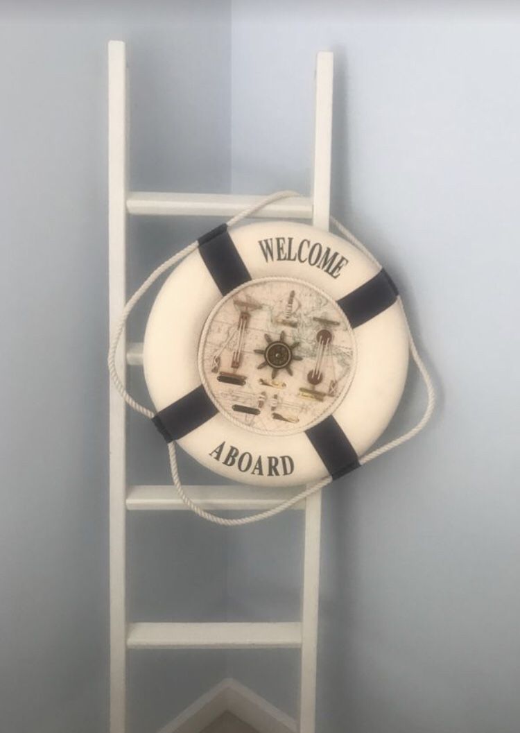 Ladder and decorative nautical buoy