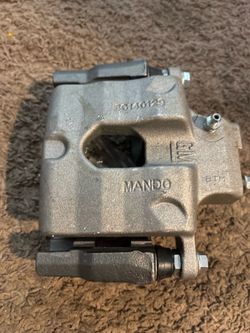 Mando-manufactured brake caliper for General Motors vehicles $65