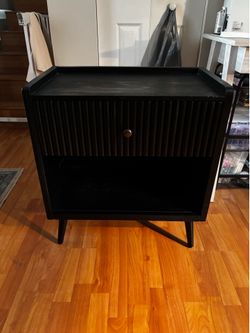 Black fluted end it coffee table
