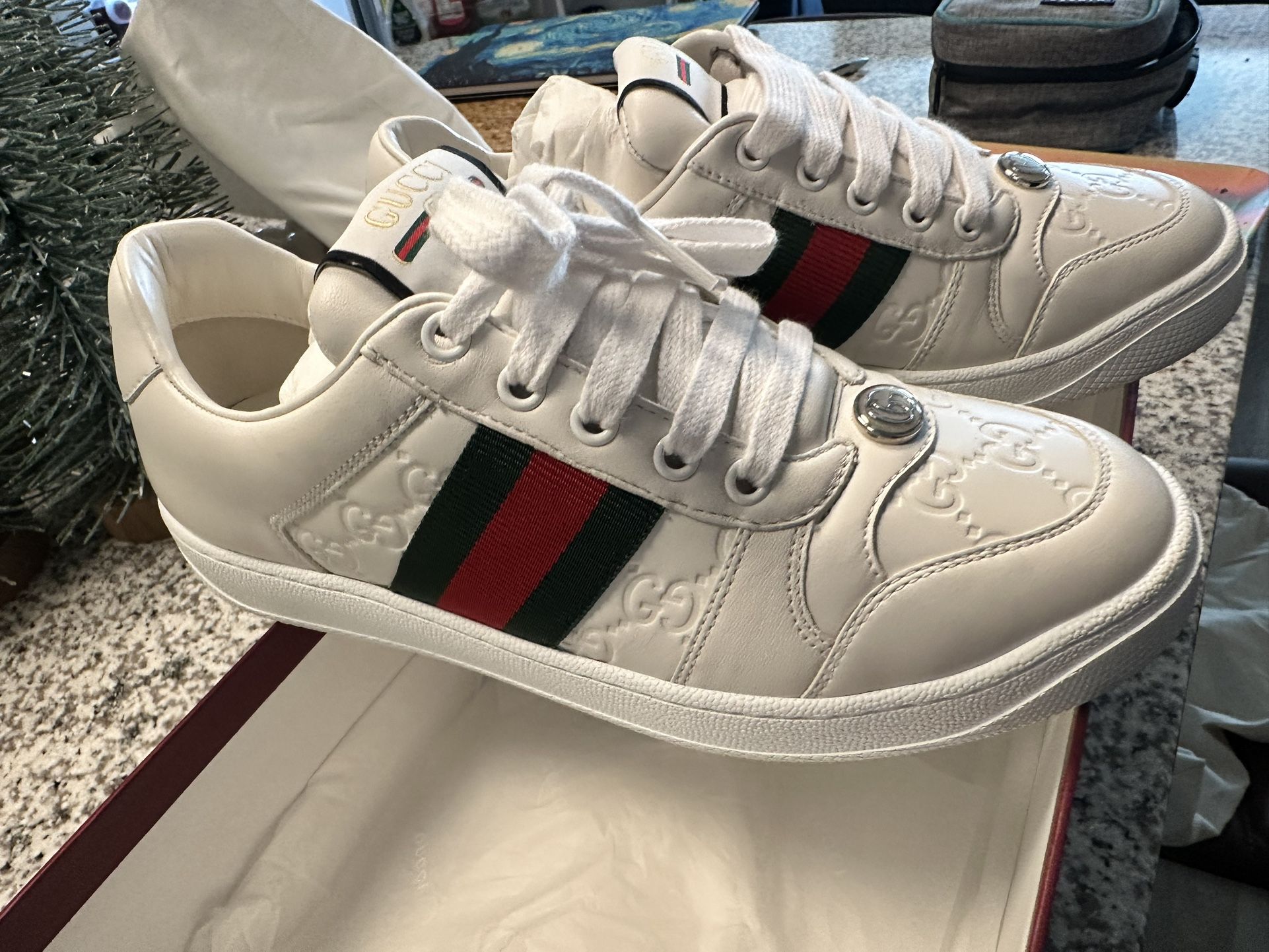 Gucci GG Embossed Leather Low-Top Sneakers