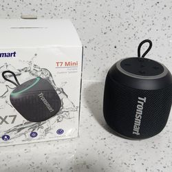 Firm On Price. Tronsmart T7 Mini Compact Portable Bluetooth 5.3 Speaker w Lights, Stereo Sound, 18H Playtime,  IPX7 Waterproof. MSRP $40. Used 1 Time