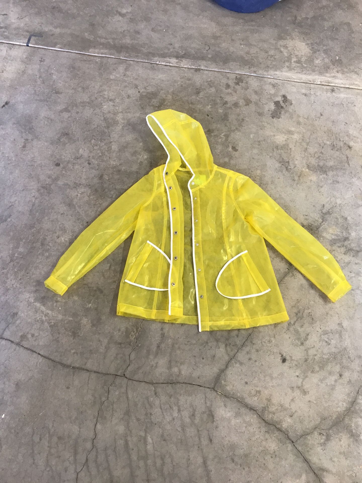 Yellow rain coat worn by Curious George