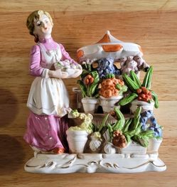 Vintage woman with her plant flower stand ceramic figure 7 1/4" tall